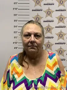 Mugshot of KIMBERLY MUSTON HUTTO booked in Morgan County, Alabama on March 23, 2026