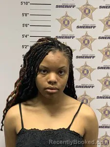 Mugshot of OLIVIA ANN DAVIS booked in Morgan County, Alabama on March 24, 2026