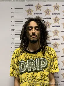 Mugshot of DEVIN OMAR TUCKER booked in Morgan County, Alabama on March 27, 2026