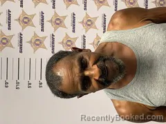 Mugshot of CHARLIE ED BURTON booked in Morgan County, Alabama on July 6, 2026
