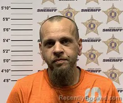 Mugshot of Thomas Adam Rigsby booked in Morgan County, Alabama on August 24, 2026