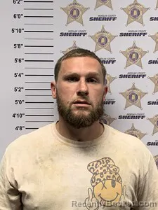Mugshot of Jacob Aaron Kidd booked in Morgan County, Alabama on August 10, 2026
