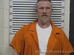 Mugshot of Conrad Mills