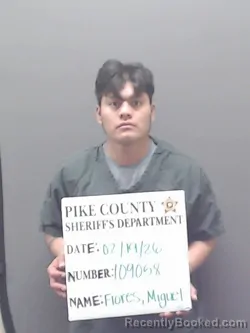 Mugshot of MIGUEL ANGEL FLORES