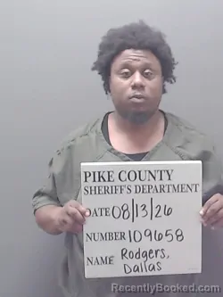 Mugshot of Dallas Dejuan Rodgers booked in Pike County, Alabama on August 13, 2026