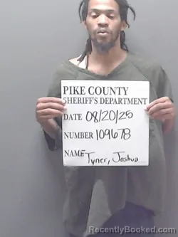 Mugshot of Joshua Javaris Tyner booked in Pike County, Alabama on August 20, 2026