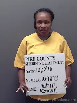 Mugshot of Kendall Kiara Monique Adkins booked in Pike County, Alabama on October 22, 2026