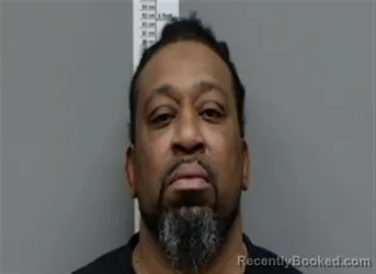 Mugshot of Michael Ladean Hughley