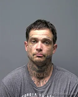 Mugshot of K SMITH booked in Russell County, Alabama on March 11, 2026