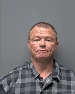 Mugshot of J MITCHELL booked in Russell County, Alabama on March 16, 2026