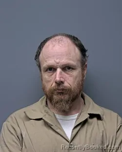 Mugshot of J WALDROP booked in Russell County, Alabama on March 20, 2026