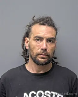 Mugshot of C MALASIG