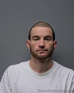 Mugshot of J SPURLOCK booked in Russell County, Alabama on March 27, 2026