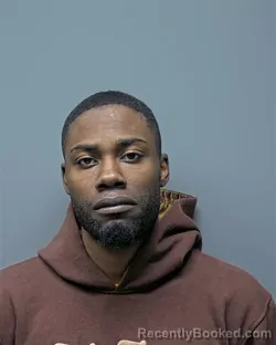 Mugshot of Q BENJAMIN booked in Russell County, Alabama on March 23, 2026