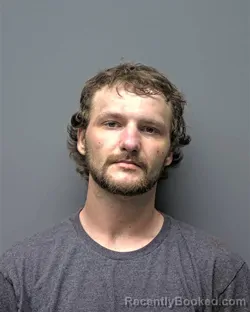 Mugshot of E SIMMONS booked in Russell County, Alabama on March 10, 2026