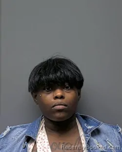 Mugshot of R GIE GRIER booked in Russell County, Alabama on March 13, 2026