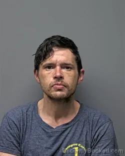 Mugshot of Q SHOCK booked in Russell County, Alabama on March 27, 2026