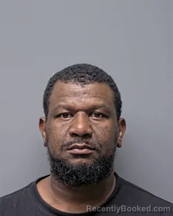 Mugshot of C MOORE booked in Russell County, Alabama on May 23, 2026