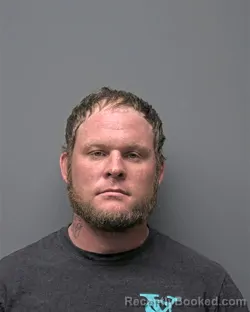 Mugshot of J MASSINGILL booked in Russell County, Alabama on March 21, 2026