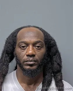 Mugshot of T HILL booked in Russell County, Alabama on May 13, 2026