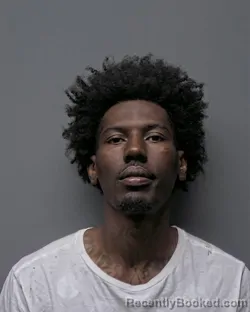 Mugshot of M DILLARD booked in Russell County, Alabama on March 26, 2026