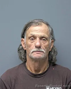Mugshot of J SMITH booked in Russell County, Alabama on May 8, 2026