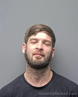 Mugshot of M JONES booked in Russell County, Alabama on March 11, 2026