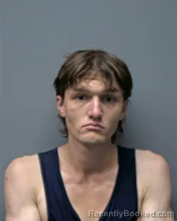 Mugshot of J DAVIS booked in Russell County, Alabama on March 23, 2026