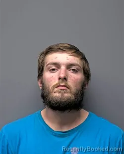 Mugshot of J PINSON booked in Russell County, Alabama on March 20, 2026