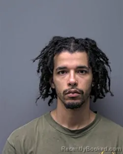 Mugshot of J BERKY booked in Russell County, Alabama on March 26, 2026