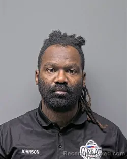 Mugshot of L JOHNSON booked in Russell County, Alabama on March 30, 2026