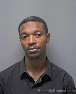 Mugshot of Q MINNIFIELD booked in Russell County, Alabama on April 2, 2026