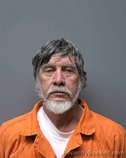 Mugshot of C WOOD booked in Russell County, Alabama on March 23, 2026