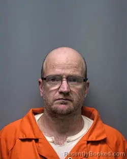 Mugshot of J BROOKS booked in Russell County, Alabama on March 19, 2026