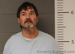 Booking photo from St Clair County, Alabama