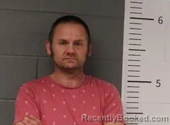 Mugshot of JOSHUA BOOZER booked in St Clair County, Alabama on March 14, 2026