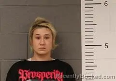 Mugshot of MCKENZIE DENNISON booked in St Clair County, Alabama on March 12, 2026