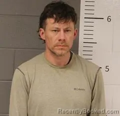 Booking photo from St Clair County, Alabama