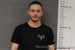 Mugshot of AUSTIN KUJAN booked in St Clair County, Alabama on March 11, 2026