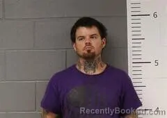 Mugshot of DUSTIN MCBURNETT booked in St Clair County, Alabama on August 4, 2026