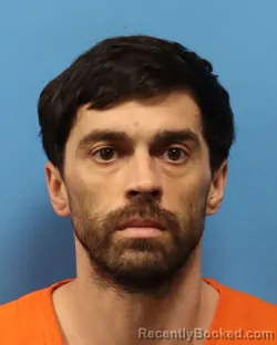 Mugshot of JUSTIN MICHAEL GOMER booked in Shelby County, Alabama on March 22, 2026