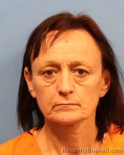 Mugshot of REGINA BARNETT ADAMS booked in Shelby County, Alabama on March 26, 2026