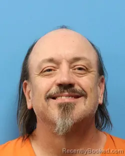 Mugshot of LAN EDWARD DICKINSON booked in Shelby County, Alabama on July 7, 2026