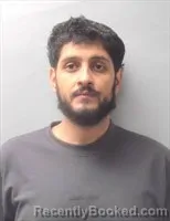 Mugshot of Nader Abdulghani Alawdi booked in Talladega County, Alabama on September 13, 2026