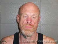 Mugshot of Christopher Adam Wood booked in Talladega County, Alabama on October 25, 2026