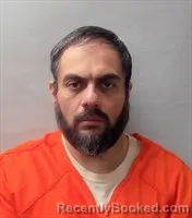 Mugshot of JOHNNY CRUZ ROMERO booked in Talladega County, Alabama on May 12, 2026
