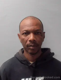 Mugshot of ANTONIO DEMEKO COOK booked in Talladega County, Alabama on April 21, 2026