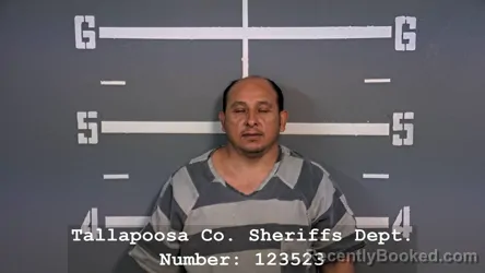 Mugshot of Alexander Figueroa Santos booked in Tallapoosa County, Alabama on August 24, 2026