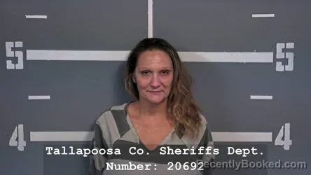 Mugshot of KIMBERLY DAVIS DELONG booked in Tallapoosa County, Alabama on April 30, 2026