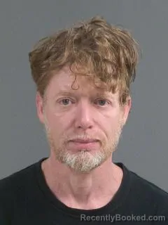 Mugshot of HENRY TOM BAKER